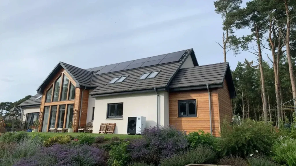 Modern house with solar panels and garden