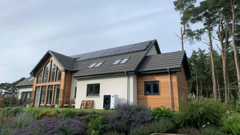 Modern house with solar panels and garden